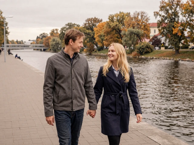 Couple walking along the Svislach River in Minsk - Belarusian dating culture values genuine emotional connection and trust